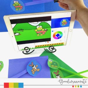 iPad with Astrobright blue and green paper and puppets for mini green screen